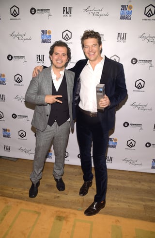 Actor John Leguizamo and Producer Jason Blum with Blum's Gotham Tribute Award in the GreenSlate Greenroom at the 2017 Gotham Awards in New York City