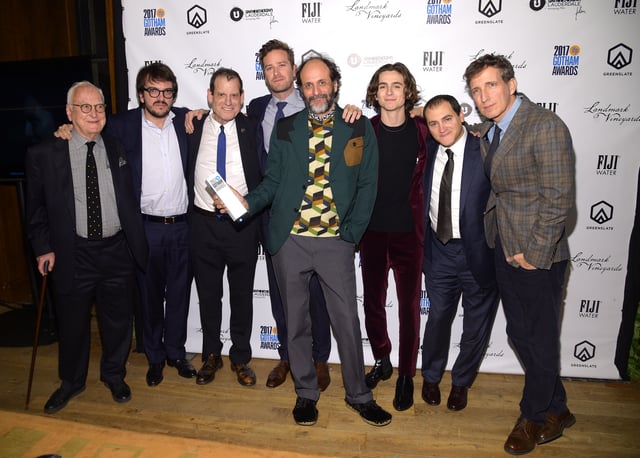 Director Luca Guadagnino and the cast of Call Me by Your Name with Call Me by Your Name's Best Feature Award in the GreenSlate Greenroom at the 2017 Gotham Awards in New York City