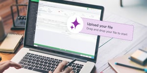 A banner with the words: Upload your file. Drag and drop your file to start. A person using a stylus on a laptop displaying the GreenSlate platform.